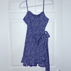 Blue floral pattern summer wrap dress.